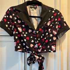 Excellent Condition, Never Worn, Hello Kitty Crop Top By Unique Vintage. Adorable Pattern. Polyester And Spandex Hand Wash Cold Size M- (6-8) 3 Buttons And A Tie At The Bottom. Hello Kitty Crop Top, Hello Kitty Black, Vintage Tops, Unique Vintage, Hello Kitty, Crop Top, Hand Wash, Kitty, Womens Tops