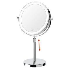 a round mirror on a stand with an arrow pointing to it