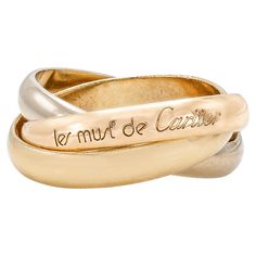 Finely crafted in 18k yellow, white, and rose gold. Signed by Cartier, from their Trinity Collection Size 55, fits US 6 3/4 Trinity Ring, Cartier, Band Rings, Jewelry Rings, Rose Gold, Band, Gold