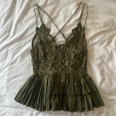 Free People Olive Green Lace Ruffled Tank Top Size Small. Never Worn! Summer Lace Top With Ruffles, Lace Tops With Ruffles For Vacation, Casual Lace Top With Ruffles, Casual Lace Tops With Ruffles, Chic Green Tops With Ruffled Straps, Womens Lace Tops, Ruffle Tank Top, Lace Ruffle, Green Lace