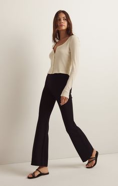 We love a good flare pant and the Do It All Flare Pant has it all! This chic high rise pant features a slim fit throughout the hips, a kick flare, and our fave detail; the supportive feel from the durable, stretchy fabric. Z SUPPLY Women's Do It All Flare Pant, Black, Extra Small Sleek Flare Pants For Fall, Chic Black Flares For Workwear, Business Casual Flared Bottoms, Chic Fitted Straight Flares, Chic Flare Pants For Fall, Elegant Stretch Flares For Fall, Chic Mid-rise Wide Leg Pants For Business Casual, Straight Leg Flares For Workwear In Fall, Chic Stretch Flares For Night Out