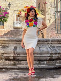 This Mexican dress is embroidered by artisanal machine and hand manipulated. The body of the dress is made with elastic for an adjustable fit that shows off your curves. This Beautiful body-con Dress is Fun and flirty, perfect for any special event. This dress is handmade with love by Mexican Artisans in Guanajuato, Mexico. More dresses here: https://www.etsy.com/es/shop/SoleiEthnic?ref=seller-platform-mcnav&section_id=25367133 Fitted Folk Dresses With Multicolor Embroidery, Fitted Dress For Fiesta Festival, Fitted Multicolor Folk Dress, Fitted Folk Style Multicolor Dress, Fitted Traditional Dress For Fiesta, Folk Style Fitted Multicolor Embroidered Dress, Fitted Bohemian Dress For Fiesta, Traditional Fitted Dress For Cinco De Mayo, Fitted Multicolor Dress For Cinco De Mayo