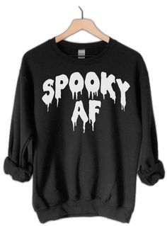 Black Grunge Sweatshirt For Halloween, Oversized Grunge Halloween Sweater, Halloween Grunge Long Sleeve Sweater, Spooky Black Halloween Sweatshirt, Grunge Halloween Sweater For Streetwear, Grunge Crew Neck Sweater For Halloween, Spooky Black Sweatshirt With Graphic Print, Horror Long Sleeve Sweatshirt For Halloween, Black Long Sleeve Horror Sweatshirt