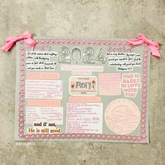 a bulletin board with pink bows on it's edges and the words 209 written in different languages