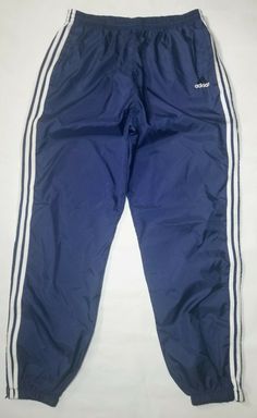 VINTAGE ADIDAS 100% NYLON MEN'S ATHLETIC PANTS SIZE: XL COLOR: BLUE w/ WHITE STRIPES EXCELLENT OVERALL CONDITION.  FEATURE HAND POCKETS, DRAWSTRING WITH ELASTIC WAISTBAND, AND CUFFED ZIP UP ANKLES. PLEASE SEE ALL PICS AND ASK ANY QUESTIONS PRIOR TO BUYING. THANK YOU FOR VISITING THROWBACK SPORTS APPAREL Adidas Track Pants Outfit Men, Adidas Track Pants Outfit, Track Pants Outfit, Mens Athletic Pants, Track Pants Mens, Pants Outfit Men, Adidas Vintage, Adidas Track Pants, Athletic Workout