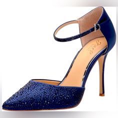 Jewel Badgley Mischka Jailene Ankle Strap Stiletto Size:8 Color: Navy Satin Condition: Brand New With Tags And Box. Faceted Crystals Accentuate The Ankle Strap And Pointy Toe Of A Lofty Stiletto Pump. -3 3/4" Heel -Textile Upper/Synthetic Lining/Rubber Sole Blue Ankle Strap Heels For Evening, Elegant Blue Heels For Night Out, Blue Fitted Heels For Gala, Chic Blue Wedding Shoes For Evening, Elegant Blue Heels With Heel Strap, Blue Ankle Strap Wedding Shoes For Evening, Fitted Blue Wedding Shoes For Party, Elegant Blue Wedding Shoes With Heel Strap, Blue Glitter Heels