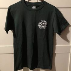 Brand New Santa Cruz T Shirt. 10/10 Condition. Never Worn Before To Small For Me. No Rips Or Tears In Perfect Condition. Non-Pet Non-Smoker Household. Casual Skateboarding Top With Front Print, Casual Tops With Front Print For Skateboarding, Casual Front Print Tops For Skateboarding, Skateboarding Short Sleeve Tops With Front Print, Short Sleeve Tops With Front Print For Skateboarding, Short Sleeve Cotton Tops For Skateboarding, Cotton Short Sleeve Tops For Skateboarding, Skateboarding Short Sleeve T-shirt With Back Print, Casual Skateboarding T-shirt With Back Print