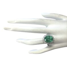 Stamped: 14K White GoldTotal Ring Weight: 7.3 GramsRing Length: N/ARing Width: N/AGemstone Weight: Total Natural Emerald Weight is 7.33 Carat (Measures: 13.80x11.02 mm)Color: GreenDiamond Weight: Total Natural Diamond Weight is 1.60 CaratColor: F-G, Clarity: VS2-SI1Face Measures: 19.35x17.18 mmSku: [702019W] Gia Certified Oval Collectible Ring, Formal Emerald Gemstones With Prong Setting, Luxury Formal Rings For May Birthstone, Luxury Emerald Ring With Accent Stones For Formal Occasions, Formal Pear-shaped Emerald Ring In White Gold, Formal Platinum Emerald Ring May Birthstone, Formal Cluster Gemstone Halo Ring, Formal Platinum Emerald Ring For May Birthstone, Cluster Gemstone Halo Ring For Formal Occasions