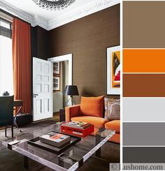 an orange and brown living room is shown in this color scheme, with the coffee table on