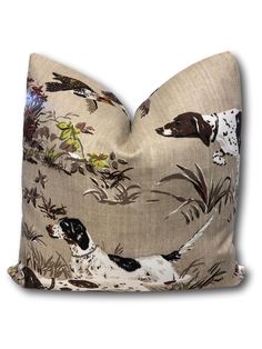 a pillow with a dog and flowers on it