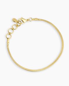 Achieve a timeless look with the Venice Mini Bracelet. This gorgeous gold-plated bracelet features a classic herringbone chain design that is perfect for any occasion. To wear, stack alongside other gold or beaded bracelets. More is more! Venice Mini Bracelet in 18k Gold, Women's by gorjana Classic Gold Jubilee Bracelet With Snake Chain, Classic Adjustable Snake Chain Bracelets, Classic Flexible Snake Chain Jewelry, Elegant Gold Snake Chain Bracelet For Everyday, Elegant Everyday Gold Snake Chain Bracelet, Classic Tarnish Resistant Snake Chain Bracelet, Elegant Gold Snake Chain Bracelet With Lobster Clasp, Elegant Gold Bracelet With Snake Chain, Elegant Gold Snake Chain Bracelets