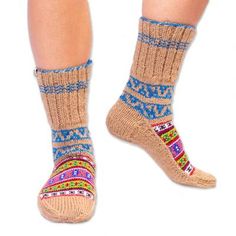 Warm your wee piggies during cold times with the help of these festive winter socks. The artisans of Himalayan Valley Knitters hand-knit the calf-length pair from a blend of acrylic and nylon crafting a cheery geometric pattern that will remind you of hot chocolate snow and ice skating. Nylon Crafts, Cold Time, Style Socks, Hand Knit Socks, Winter Socks, Knitted Slippers, Chai Tea, Snow And Ice, Ice Skating