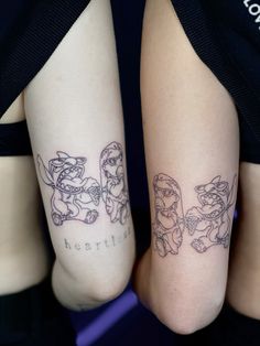 two people with matching tattoos on their legs, one has the word'love'tattooed on her leg