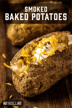 baked potatoes with shredded cheese on top and the words smoked baked potatoes written in white