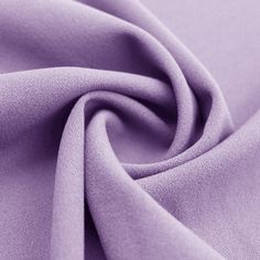 a close up view of a purple fabric