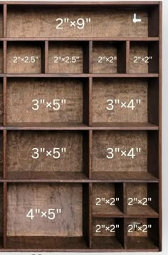 a large wooden shelf with measurements on it