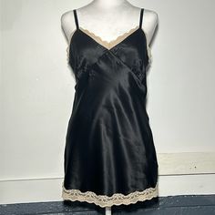 100% Silk Slip With Lace Accent Adjustable Straps Perfect Fit, Never Worn Ptp 18” Black Satin Sleepwear With Lace Trim, Black Satin Camisole With Lace Trim, Black Sleepwear With Lace Trim And Spaghetti Straps, Black V-neck Sleepwear With Lace Trim, Black Satin Camisole Sleepwear, Black Fitted V-neck Sleepwear, Black V-neck Fitted Sleepwear, Black Lace Trim Cami Sleepwear, Black Cami Sleepwear With Lace Trim