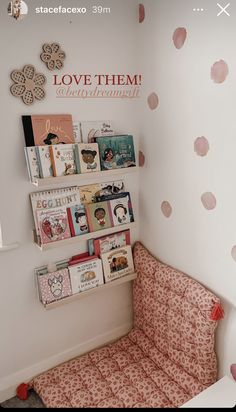 there is a small child's room with polka dots on the wall and bookshelves