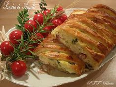 bread and tomatoes on a white plate