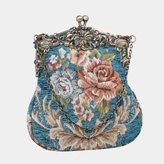 Introducing our captivating collection of Chatelaine purses, inspired by the elegance of the Victorian era.Available in three sizes—Large, Medium, and Small—these purses offer versatility and style. The Large and Medium sizes can be used as both a clutch and a crossbody purse, as we provide two chains for each size: 50" and 13" in length. This allows you to effortlessly switch between crossbody and clutch styles.Let's focus on the Chatelaine Large Crossbody Purse:With a frame width of 6.25" and a height of 8", this purse comfortably holds larger items like the iPhone 14 Pro Max and a passport. It features a small slip pocket for cards or small essentials, and the 1.5" bottom depth provides ample space for your necessities.The Large Crossbody Purse includes two chains, each with brass hooks Elegant Handheld Travel Wallets, Elegant Handheld Travel Wallet, Elegant Handheld Wallets For Daily Use, Elegant Handheld Wallet For Daily Use, Vintage Clutch For Daily Use, Elegant Blue Wallets, Elegant Handheld Wallets For Gifts, Elegant Handheld Wallets Perfect For Gifts, Elegant Handheld Evening Wallet