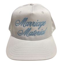 The "Marriage Material" Trucker Hat adds a fun twist to your accessory collection, perfect for brides-to-be or wedding festivities. With its playful message, this hat makes a great addition to casual outfits, whether you’re heading to a bridal shower or enjoying a sunny day out. Shop more Hats White and blue Embroidered Wedding Trucker Hats For Guests, Casual White Personalized Trucker Hat, Bridal Trucker Hats, White Customizable Novelty Trucker Hat, Bride Trucker Hat With Patches, Family Over Everything, White Jumpsuit Dress, Marriage Material, Slides Slippers