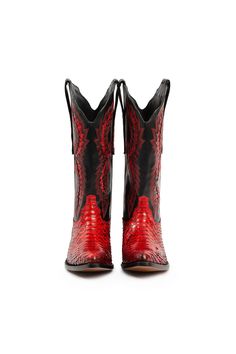 Get ready to soar in style with our best-selling cowboy/cowgirl RockiesRebels Eagle Lake boots! Hand-made with luxurious Red Python leather, these stunning designer western boots are a must-have for any female male western fashion lover who appreciates the finer things in life. The intricate detailing of the eagle wings on the shaft and layers of python and calf leather give these designer boots an undeniable personality that is sure to turn heads wherever you go. The deep red and black color co Wide Calf Cowgirl Boots, Red Snake, Eagle Wings, Spot Lights, Female Male, The Eagle, Cowboy Cowgirl, Red Heels, Cowboy And Cowgirl