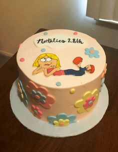 a birthday cake with a cartoon character on it