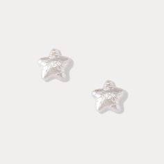 The Pearl Star Stud Earrings from our Pearl Collection are the epitome of understated elegance, perfect for refining a minimalist outfit with a touch of celestial grace. Featuring lustrous freshwater pearls set in shimmering silver, these star stud earrings radiate both simplicity and sophistication. Their delicate star shape captures a dreamy, ethereal quality, while the pearls evoke timeless beauty. Whether you’re dressing up for a formal event or elevating your everyday look, these pearl earrings add a hint of starlight that shines through in every ensemble. A versatile treasure, they will seamlessly complement your minimalist wardrobe. DETAILS Materials:   Freshwater Pearl, Silver Measurements: 0.47"*0.47" (1.2cm*1.2cm) Weight: 2.1g Star Stud Earrings, Star Earrings Stud, Pearl Collection, Minimalist Wardrobe, Pearl Set, Silver Stud Earrings, Star Studs, The Pearl, Understated Elegance