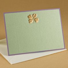 a card with a four leaf clover on it