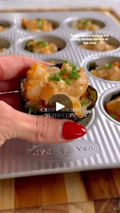 125K views · 2.8K reactions | @kalejunkie CRISPY SHRIMP “SUSHI CUPS”! I can’t believe it’s been two years since I shared the salmon version of these baked cups and they went viral, so today I’m resharing the shrimp version inspired by my bestie @themodernnonna. They are AMAZING! And also RIP to my long hair LOL. The shrimp is tossed in a delicious sauce and gets nice and crispy in the oven—the perfect handheld, bite sized appetizer or meal!⁣
⁣
1 1/2 cups cooked rice, I used jasmine but any rice will work⁣
3 sheets nori, cute into 12 squares⁣
1 lb peeled and deveined shrimp (uncooked), cut into small pieces⁣
Pinch of salt⁣
1/2 cup softened cream cheese⁣
3 tb kewpie mayo⁣
1 tsp sriracha⁣
2 tb soy sauce or coconut aminos⁣
Chives for garnish ⁣
⁣
Prepare 2 cups of rice according to package inst Salmon Shrimp Sushi Bake, Baked Shrimp Sushi Cups, Spicy Shrimp Crispy Rice Cups, Crispy Shrimp Sushi Cups, Sushi Cups Shrimp, Shrimp Seaweed Cups, Shrimp Sushi Bites, Rice Cups Baked, Shrimp Sushi Bake Cups