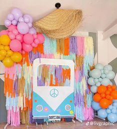 there is a vw bus decorated with balloons and streamers