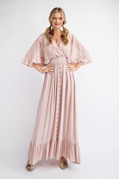 Be ready for your close-up in this Aspen Maxi Dress! With contrast lace at the top and a smocked waistband for cozy comfort, this dress will make you stand out in style. Plus, the wide and wily sleeves, button down skirt, and ruffled hemline make it totally photogenic! (And don't forget to tie up the back before you go!) Fabric Contents Rayon Imported Spring Dresses With Smocked Bodice And Lace, Spring Lace Dress With Smocked Bodice, Lace Maxi Dress With Flowy Skirt, Flowy Lace Maxi Dress, Elegant Lace Maxi Dress With Flowy Skirt, Lace Dress With Lace Trim And Flowy Skirt, Ruffle Sleeve Maxi Dress For Daywear, Bohemian Ruffle Sleeve Daywear Dresses, Casual Lace Maxi Dress With Ruffles