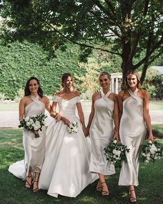 the bridesmaids are all dressed in white dresses