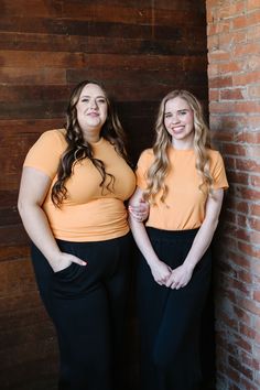 Feel the summer vibes with Jessa In Marigold! This cheerful and lightweight orange top features a flattering ribbed texture, short sleeves, and a fitted style for a perfect fit. Stay stylish and comfortable all day long in this must-have piece. This top is paired with the Marigold Maxi Skirt. Fits true to size. Model is wearing a small and is 5'3". Plus model is wearing an XL and is 5'7". The color in the pic shown with the Marigold Maxi Skirt is more color accurate. Size Chart Length Bust S 21. Fitted Short Sleeve T-shirt For Loungewear, Solid Ribbed Stretch Short Sleeve Top, Everyday Ribbed Short Sleeve Top, Solid Color Ribbed Short Sleeve Stretch Top, Ribbed Short Sleeve Top For Everyday Summer Wear, Solid Stretch Ribbed Short Sleeve Top, Stretch Ribbed Solid Short Sleeve Top, Ribbed Stretch Short Sleeve Top, Ribbed Stretch Short Sleeve Top For Summer