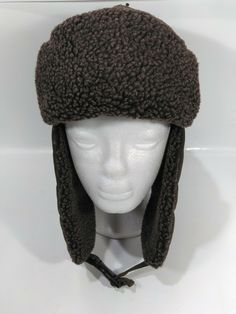 Wilson's Leather Mens Brown Trapper Hat M/L Winter Cold Weather.... Condition is New with tags. Shipped with USPS First Class. Brown Fleece-lined Cap, Brown Cap With Fleece Lining, Adjustable Brown Hat With Fleece Lining, Vintage Hats With Adjustable Ear Flaps, Trapper Hat, Trapper Hats, Winter Cold, First Class, Cold Weather