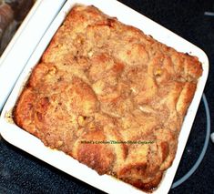 a square casserole dish is sitting on a table