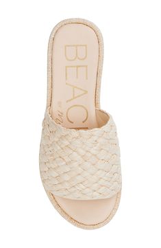 Embrace the earthy sophistication of this lofty sandal fashioned with a woven strap and textured platform sole. 1 3/4" heel Contoured footbed with arch support Synthetic upper, lining and sole Imported Costal Grandma Shoes, Natural Straw Sandals With Removable Insole, Comfortable Natural Wedge Sandals For Beach, Natural Sandals With Textured Straw Sole, Beige Woven Sandals For Beach Season, Natural Straw Sandals With Textured Footbed, Comfortable Beach Wedge Sandals With Textured Sole, Natural Sandals With Woven Sole For Beach Season, Vacation Sandals With Textured Sole And Synthetic Material