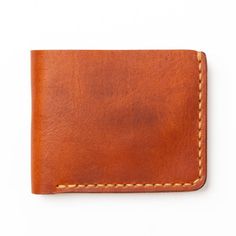 Our Black Leather Billfold is stylish yet functional. With a sleek design, durable construction and 6 card slots, it's perfect for any fashion-conscious individual. Horween Chromexcel, Leather Billfold, Horween Leather, Billfold Wallet, Leather Bifold Wallet, Black Hand, Full Grain Leather, Hand Stitching, Black And Navy