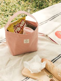 Editor's NotesThis lunch bag has a simple and cute design making it great to bring around any lunch with joy. - Simple yet modern design- Different color options- Great to use dailyMeasurements(in.)ONE SIZE- 7.09 in. x 4.72 in. x 7.48 in. *measurements may vary by ±1.2 in. Composition- Material: 100% CottonDesigner- by LIVEWORK Lunch Box Photography, Lunch Places, Best Lunch Bags, Bags For Sale, Cooler Tote, Cooler Lunch Bag, Office Items, Stationery Organization, Pvc Coat