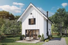 a white house with black shutters on the front and side windows is surrounded by greenery