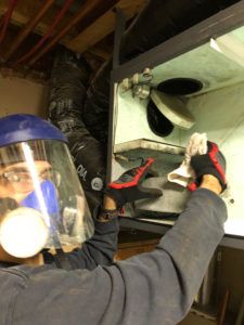 a man wearing a helmet and protective gear