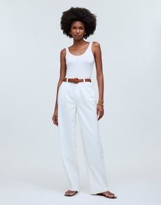 The cut: a fresh take on our best-selling pants, these pleated baggy jeans are fitted through the high waist with wide legs, plus have raw hems.The fabric: loosely woven for a drapey, soft-to-the-touch feel, our premium 100 percent cotton white Cone Airy Denim has no stretch and zero show-through.Perfect white shade.11 3/4" rise, 22" leg opening, 30" inseam.98% cotton/2% spandex.Do Well: By buying cotton products from Madewell, you're supporting our investment in Better Cotton's mission to help Classic Relaxed Fit Wide Leg Pants For Summer, Classic Wide Leg Pants With Relaxed Fit For Summer, Classic Cotton Wide Leg Pants For Summer, Classic High-waisted Wide Leg Summer Pants, White Wide Leg Summer Pants With Belt Loops, White Wide Leg Pants With Belt Loops For Summer, Classic Wide Leg Pants With Belt Loops For Summer, Classic Summer Wide Leg Pants With Belt Loops, Chic High Rise Wide Leg Summer Pants