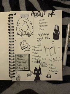 an open notebook with doodles and pictures on it