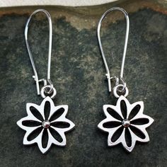 Here are some very cute and pretty little flower dangle earrings.  They have incredible detail and design.  These earrings are lightweight and versatile, perfect for everyday wear.The earrings measure 5/8” long by 5/8” wide and hang from a 1” kidney style ear wire that latches closed.  Overall drop length is 1 3/4”.  Made from allergy free plated silver.I have a matching necklace in my shop, if you would like the whole set.  Here is a direct link.......... https://etsy.me/3up3HSoThanks for stopp Sterling Silver Flower Charm Earrings, Everyday Drop Flower Earrings For Pierced Ears, Cute Flower-shaped Pierced Earrings, Cute Flower Shaped Hypoallergenic Earrings, Cute Hypoallergenic Flower-shaped Earrings, Pierced Drop Flower Earrings For Everyday, Cute Flower Shaped Earrings With Ear Wire, Cute Flower Charm Earrings For Everyday, Everyday Pierced Flower Drop Earrings