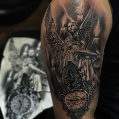 a tattoo with an angel sitting on top of a clock next to a man's arm