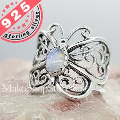 Handmade Sterling silver 925 Butterfly Ring Beautiful filigree pattern and gemstone of your choice  Condition: Brand new Material: .925 Sterling Silver Finishes: Highly Polished finish Ring Width: 19 mm (front) Stone: 6 by 4mm stone see selection of genuine cabochon gemstones This is a high quality sterling silver ladies ring with gemstone. The ring features a nice Large Butterfly (wings are filigree see-through designs). Stamped 925 Exclusively here directly from it's Designer Artist ! Select bellow your size & stone. Comes with jewelry box Intricate Design Moonstone Jewelry, Intricate Moonstone Jewelry For Gift, Intricate Moonstone Jewelry As A Gift, Silver Sterling Silver Moonstone Ring As Gift, Nickel-free Silver Sterling Moonstone Ring, Sterling Silver Filigree Ring With Gemstone For Gift, Silver Oval Moonstone Ring With Intricate Design, Sterling Silver Butterfly Ring With Gemstone For Gift, Bohemian Sterling Silver Filigree Ring For Anniversary