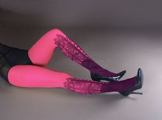 All tights are hand made to order and are ready to ship within 6 business days after payment is received. Shipping itself usually takes 7-20 business days. If you're in a hurry, please purchase a shipping upgrade upon checkout. We are extremely proud to introduce our new collection! Absolutely stunning Lace Up Print tights printed on magenta. One size. Fits from XS up to L From about 150cm to about 167cm height Full length. Closed toe. Thickness: 50 DEN Soft and comfortable microfiber tights/pan