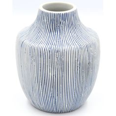 a blue and white striped vase on a white background