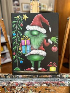 a painting of an elf holding a christmas present