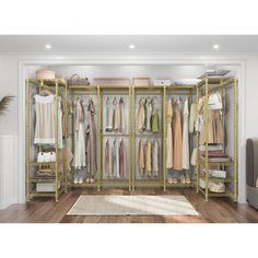 an open closet with clothes hanging on shelves